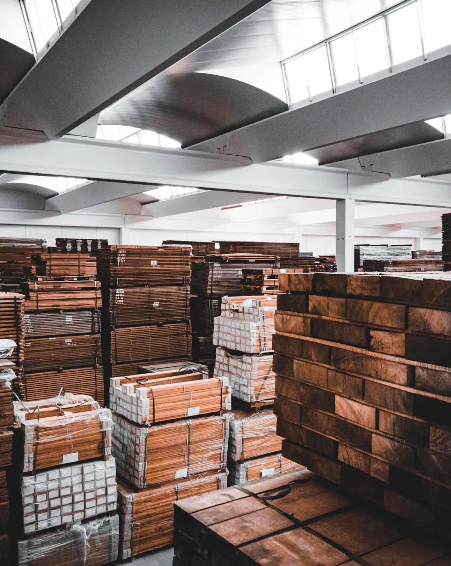 Stacks of seasoned timber in the warehouse